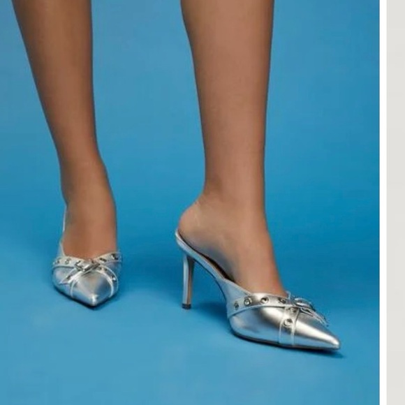 Brand new, never worn. Silver metallic pointy toe heels. So cute! Size 7. - Picture 2 of 6